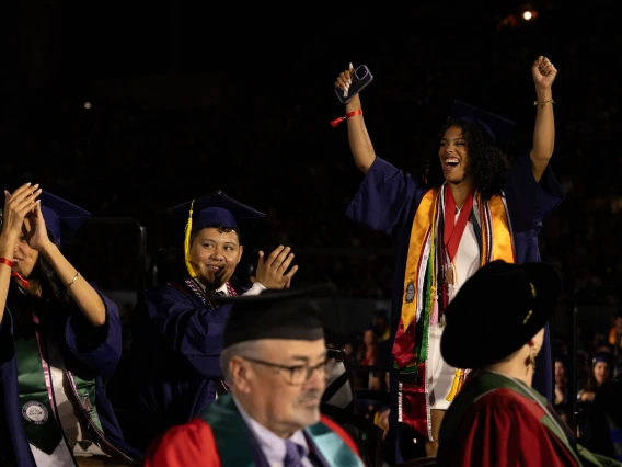 Awardees celebrating on stage